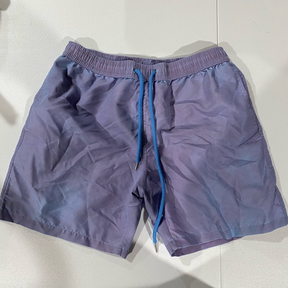 Boys swim shorts changes color with water fits small